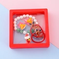 Kids Christmas jewelry set with beaded bracelet and charms in a red suspension box - Style 11