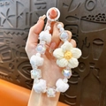 Handmade cute crochet flower beaded phone charm with white plush pom-poms and beads - White