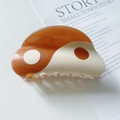 Caramel and cream acetate hair claw clip featuring a unique Tai Chi Yin Yang design - Brown / Large (9.5cm)