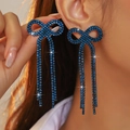 Sparkling blue bow tassel earrings with rhodium plating and cubic zirconia crystals - Stud Earrings / Peacock Blue