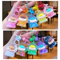 Astronaut quicksand keychains in various colors with glitter and cartoon figures - Glow Fruit Girl (Mixed Color)