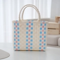 Pink and blue striped woven picnic bag with cream base and sturdy handles for spring outing - Plain Plaid / Beige Main Color Vertical Stripe