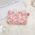 Detail of pink quilted fabric coin purse with cute bunny and floral print on soft rug - Flower Yellow Rabbit