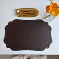 Deep brown faux leather placemat with scalloped edges and embossed dot details - Embossed Irregular Coffee