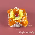 Realistic orange PU faux fruit slice cake with yellow fruit topping and 7.5cm white tray - Pineapple