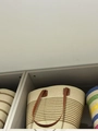 Beige woven beach tote with brown PU leather handles and stripe accents on display - Beige Brown Narrow Stripe