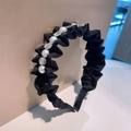 Elegant black pleated fabric headband with pearls and rhinestones on a beige backdrop - S18 Black Pleated Pearl Rhinestone Style