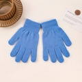 Flat lay of blue knitted gloves with ribbed cuffs on a neutral background with props - 19x10cm / Women-Medium Blue