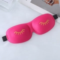 3D contoured rose red sleep mask with yellow eyelashes on a white plush surface - Gold Stamping Eyelash Style / Rose Red