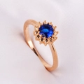 Elegant 18K gold plated ring with a deep blue round zircon in a floral setting - Blue Sunflower Style (Royal Blue)