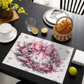 Pink ribbon wreath placemat on a black wooden table with dining accessories for Christmas - CD57-33