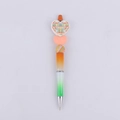Detail of DIY beadable pen with heart decor featuring a colorful book pattern and gradient body - Books