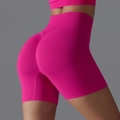 High-waisted seamless peach lift yoga shorts in vibrant magenta pink for fitness - S / Dragon Fruit