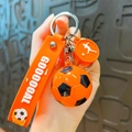 Portachiavi da calcio arancione con cinturino in silicone e ciondolo con scritta Goal - Arancione