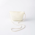 Detail shot of beige straw woven crossbody bag with zipper and long cord strap - Off-white Large Bag (20*15cm)