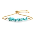Adjustable gold chain bracelet with raw turquoise beads on a minimalist white background - Gold & Turquoise