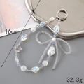 Handmade pearl and star beaded phone charm with bow pendant, 16cm long wrist strap - Iridescent Irregular White Bow Style (K3291)
