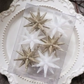 Set of 6 gold and white glitter star ornaments in a clear gift box on a white tray - 8CM Explosion Star Mixed Colors 6-Piece Set