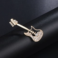 Artistic gold-plated guitar brooch with sparkling white rhinestones on black stand - Gold Guitar Brooch