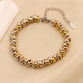 Macro shot of tricolor woven stainless steel chain bracelet with lobster clasp and tag - Three-color (B-53)