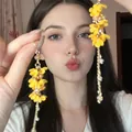Gelbe Blume goldene Quaste Stil