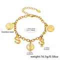 Detail of gold stainless steel chain bracelet featuring coin charms and letter S pendants - Gold-Letter S