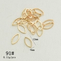 Detailed view of 12mm gold-plated hollow leaf jewelry charms for DIY earring making - 12mmx6mm / Gold/91# Marquee