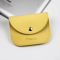 Bright yellow lychee grain leather coin purse with snap closure and Pieru logo - Yellow