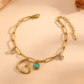 Detail von 18k vergoldetem Edelstahlarmband mit Herzanhänger und Türkis-Edelstein - Hohles Herz Zirkon Armband (I722)