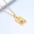Detailed close-up of a gold Capricorn zodiac pendant on a stainless steel chain - Capricorn / Gold