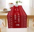 Detail of red linen Christmas table runner featuring white knitted reindeer and snowflake patterns - Red Background/White Reindeer/Snowflake/MERRY CHRISTMAS / 33*183cm