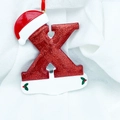 Red glitter Christmas letter X hanging ornament with Santa hat and resin finish - Letter X