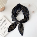 Pleated navy blue silk scarf with golden floral patterns in a stylish knot design - Navy Base Paisley Clover