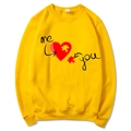 Bright yellow long sleeve crewneck sweatshirt featuring a heart and puzzle print design - Yellow (Pattern 2)