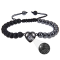 Detail of adjustable black beaded bracelet with heart-shaped 100 languages projection stone - Black Magnetic Stone and Frosted Stone Bracelet