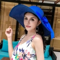 Women's dark blue wide-brim straw hat with a large elegant satin bow for beach sun protection - One Size / Solid Royal Blue