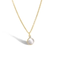 Minimalist gold necklace featuring a round white opal pendant and zircon accent - White