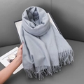 Soft grey faux cashmere scarf with fringe tassels shown in a cozy lifestyle setting - 68x180cm / Light Grey (No.8)