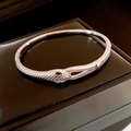 Silver snake-shaped open bangle with green gemstone eyes and white cubic zirconia accents - 21# Silver Snake Head Buckle