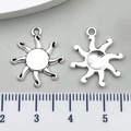 Silver alloy sun-shaped pendants with ruler showing size measurement for DIY jewelry - Swirl Sun 16x19mm
