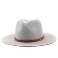 Detail of light gray straw weave and brown leather belt with gold metal studs on hat - Gray