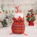 Knitted Christmas gift bag featuring a snowman design with red and green pattern - Knitted Snowman Bag
