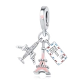 Macro shot of silver airplane, pink Eiffel Tower, and wish you were here postcard charm - Airplane Tower Postcard