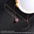 Collana girasole oro rosa con zircone viola e catena in acciaio al titanio da 45 cm - Stile Rotante 11/Girasole in Pietra Viola