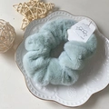 Soft faux rabbit fur scrunchie in mint green color with stainless steel label tag - Light Green