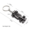 F1 race car keychain in dark gunmetal finish with streamlined metallic body - X-035 Black Hollow F1 Racing Car