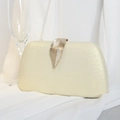 Elegant champagne gold evening clutch with vertical silk texture and gold leaf clasp - Light Yellow