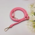 Detail of pink lychee pattern PU leather adjustable shoulder strap with gold lobster clasps - Pink