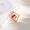 Golden diamond resin pendant with real red dried flowers and golden beads charm - Rhombus Red Flower Gold Beads