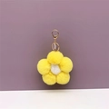 Detail of soft yellow and white plush flower bag charm with golden spring clasp link - 1 Piece / Yellow